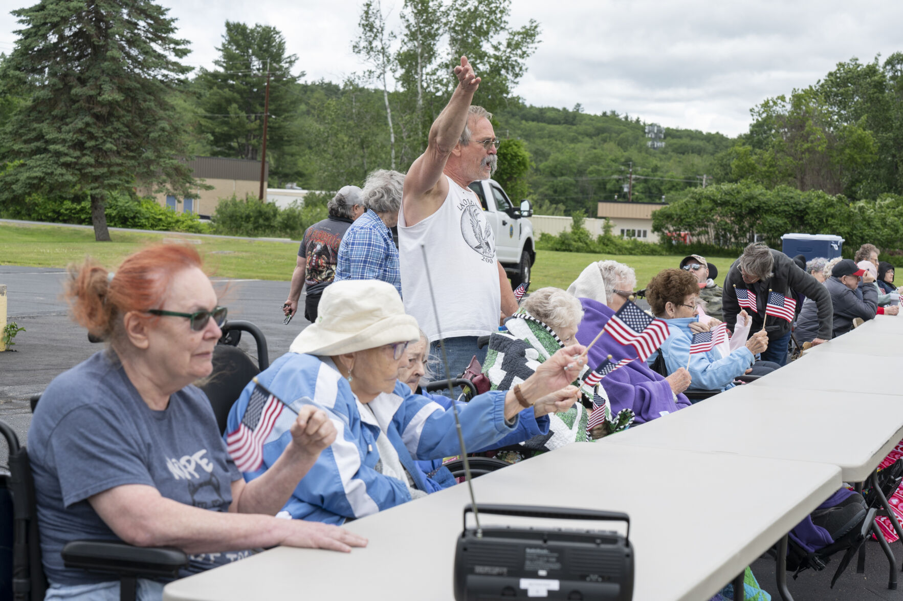 Staff and residents wave